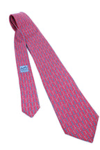 Corbata Hermés rosa con infinitos azules