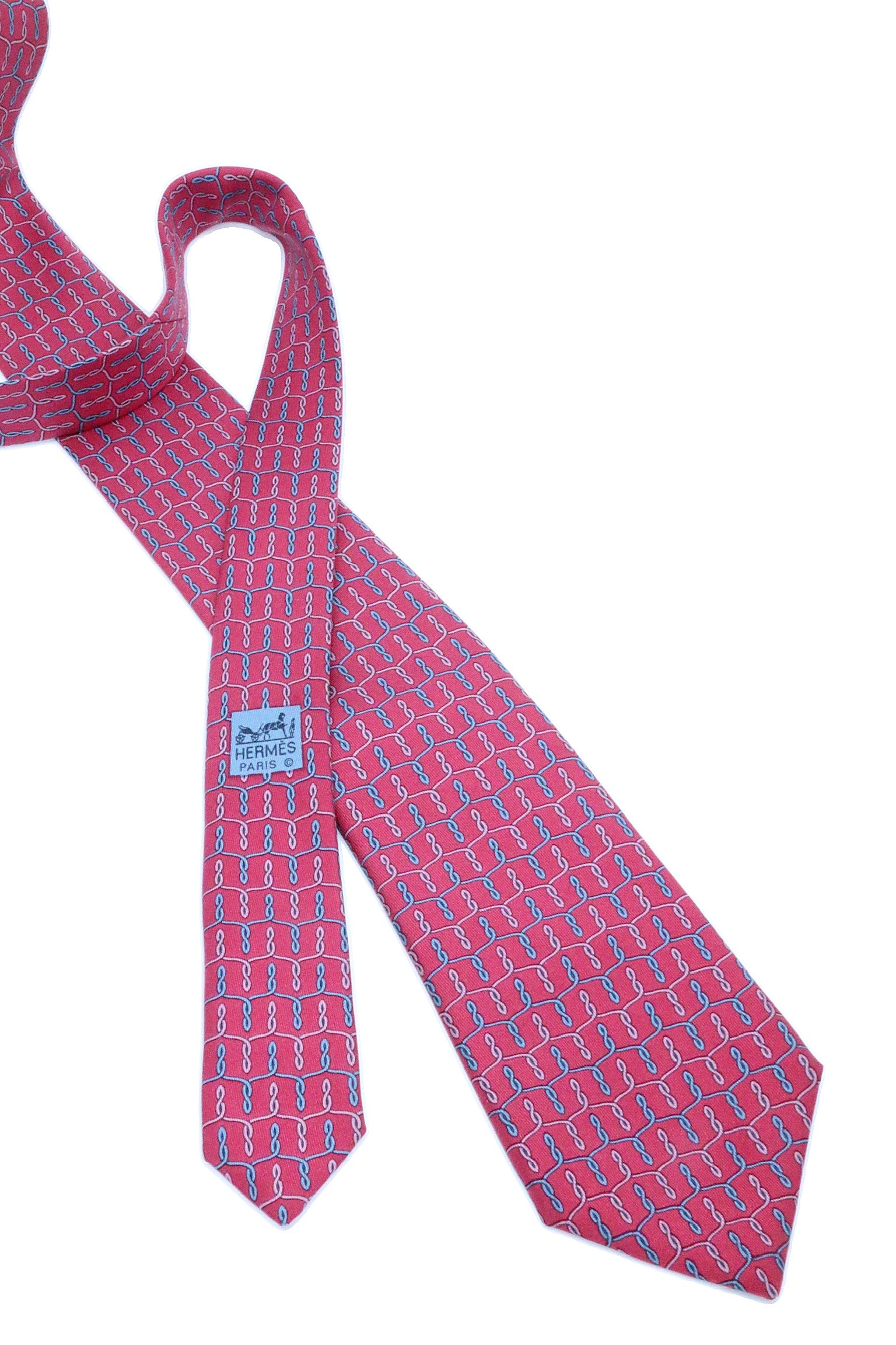 Corbata Hermés rosa con infinitos azules