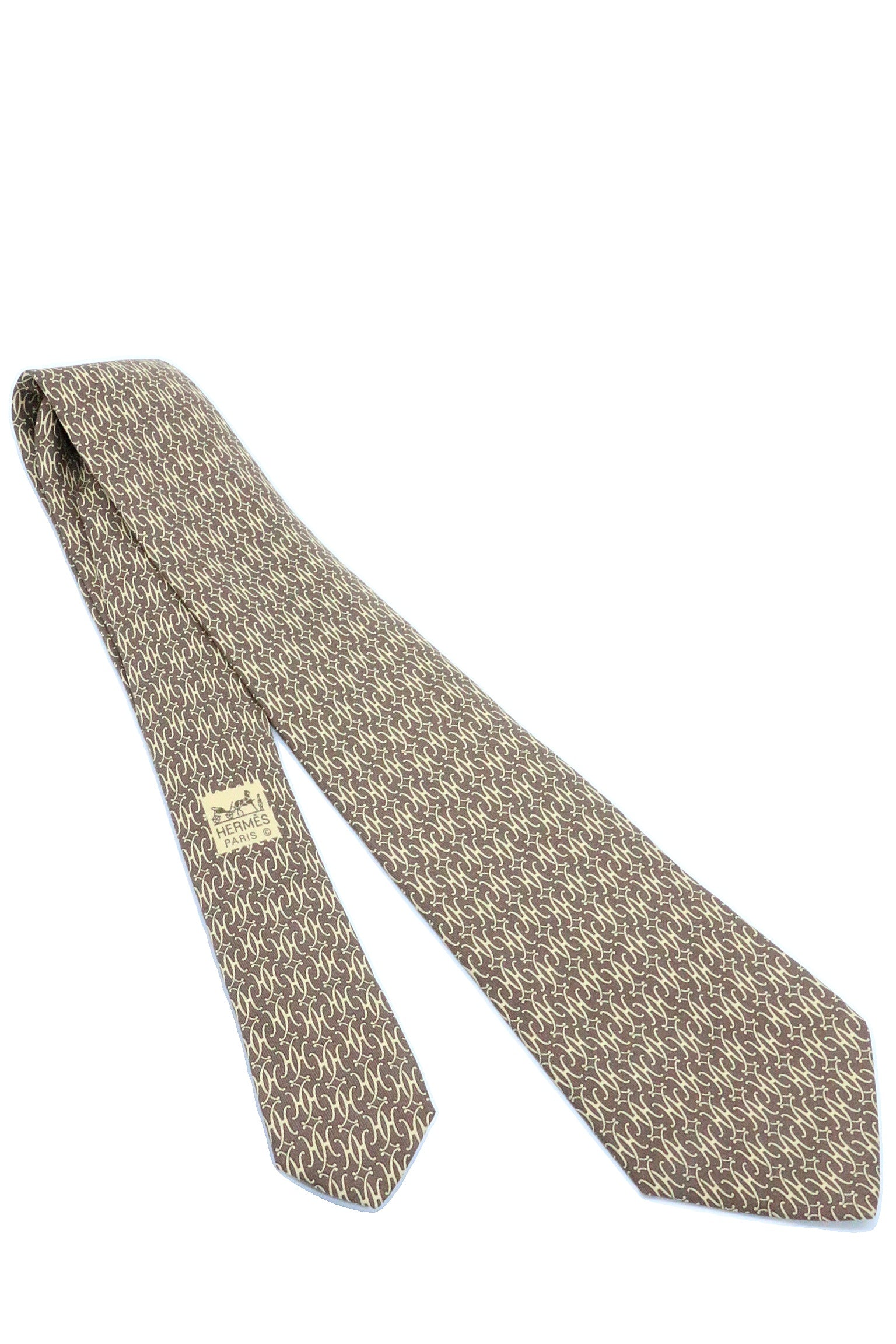 Corbata Hermés café clarito con H amarillas