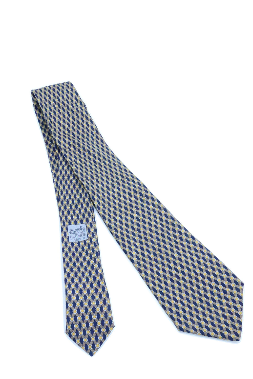 Corbata Hermés azul marino con puntos amarillos