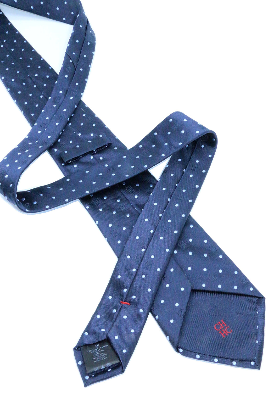 Corbata Carolina Herrera azul marino con puntos blancos