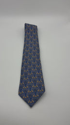 Corbata Hermés azul con dorado
