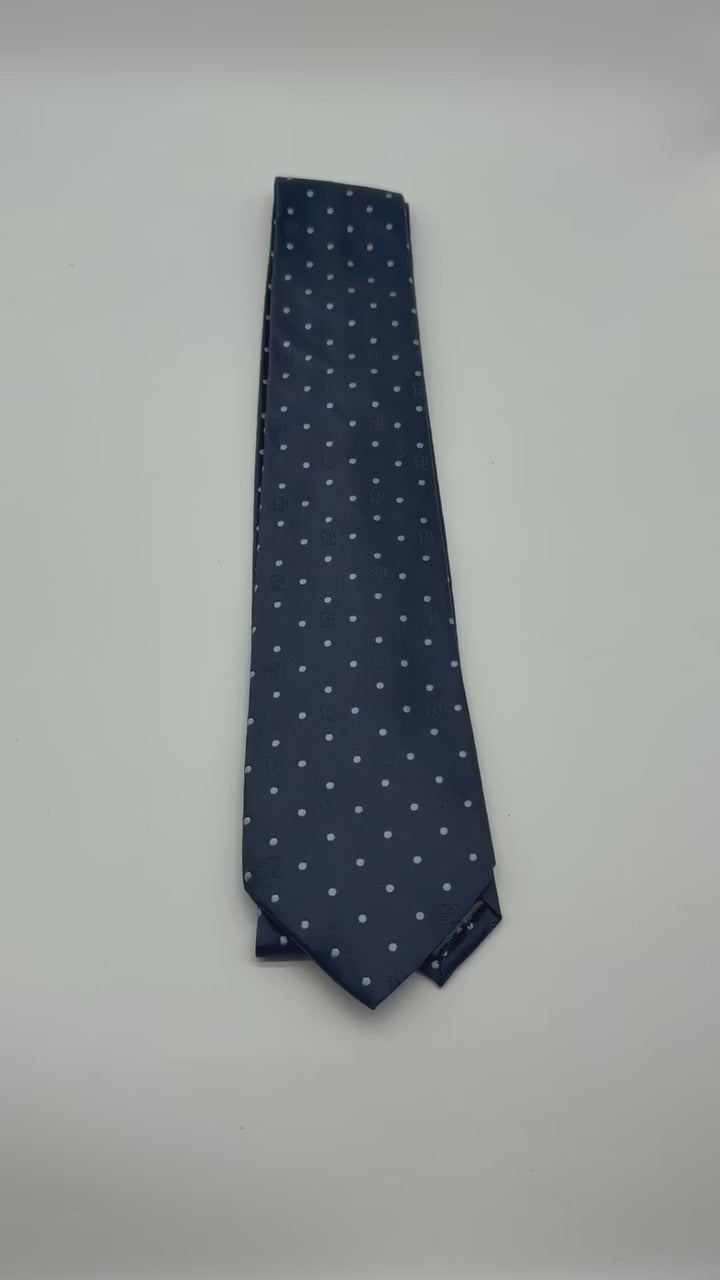 Corbata Carolina Herrera azul marino con puntos blancos