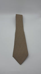 Corbata Hermés beige con herrajes beige