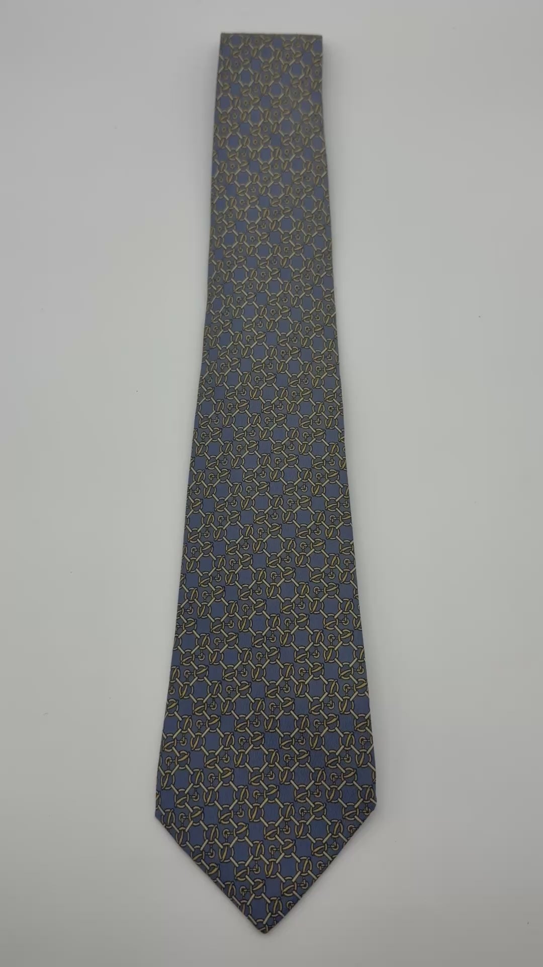 Corbata Hermés gris con amarillo
