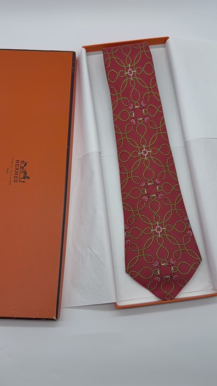 Corbata Hermés ladrillo con cinturones
