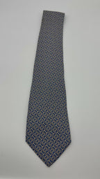 Corbata Burberry azul con círculos dorados